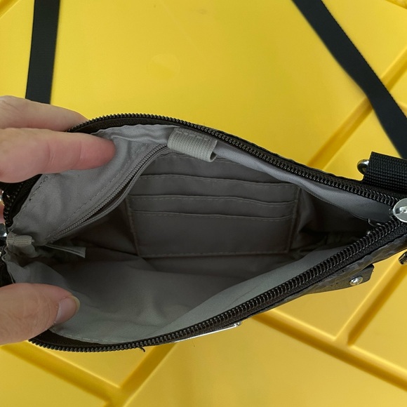 Baggalinni. New without tags. Crossbody with wristlet strap. - Picture 2 of 4